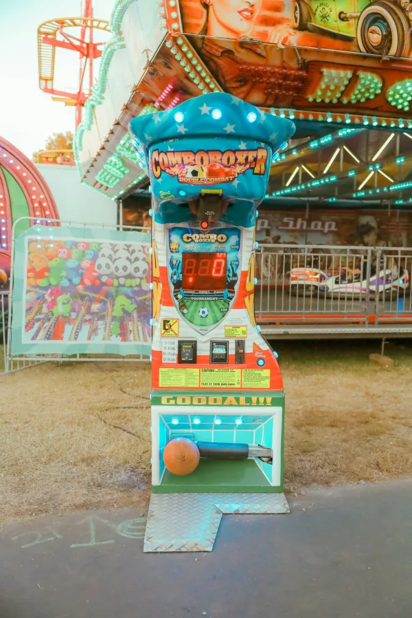 Balloon Darts Game at a Fair