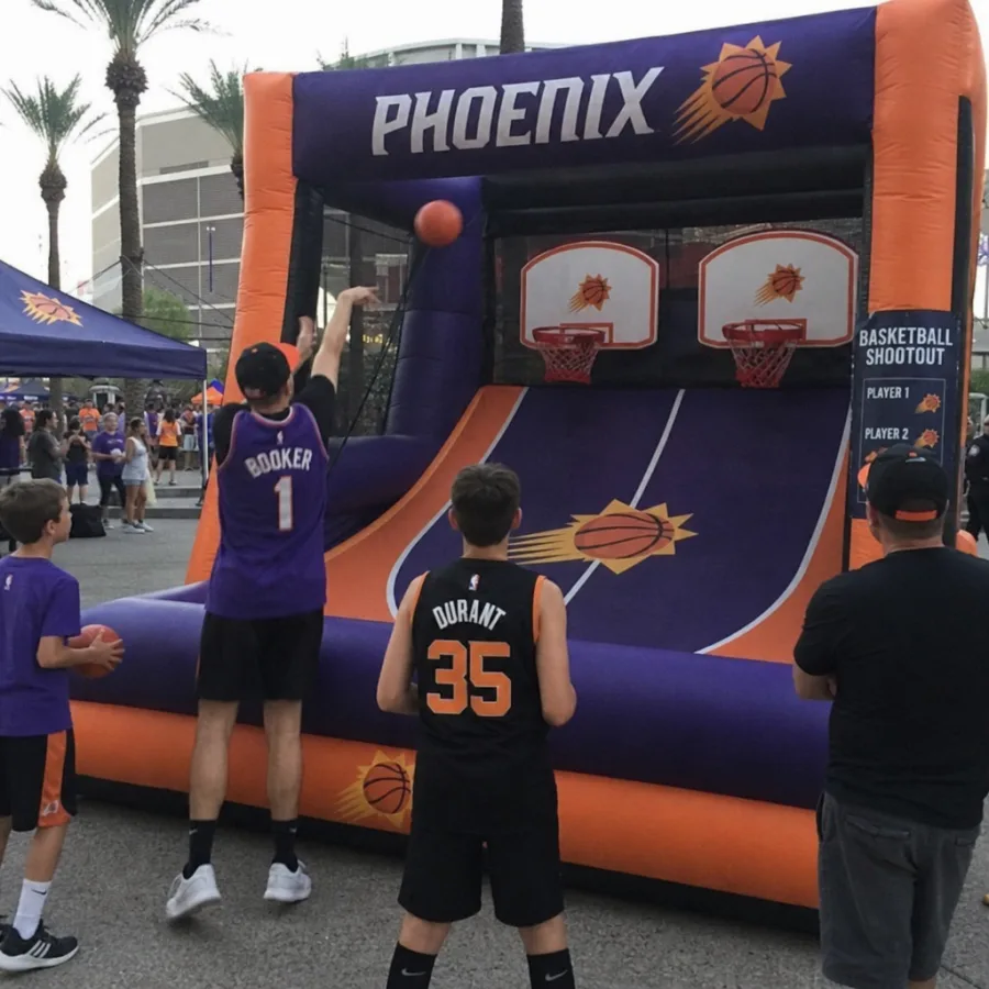 Guests playing an inflatable basketball shootout game at a Phoenix event