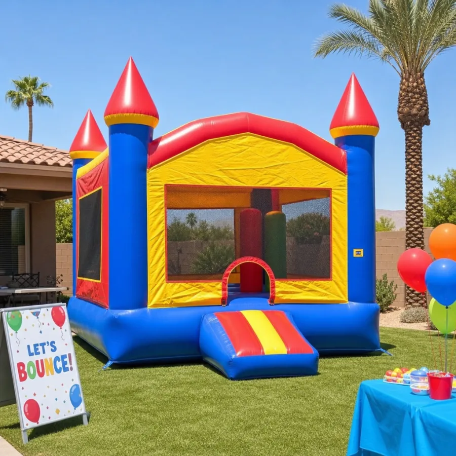 A bright and colorful bounce house set up in a sunny Phoenix backyard