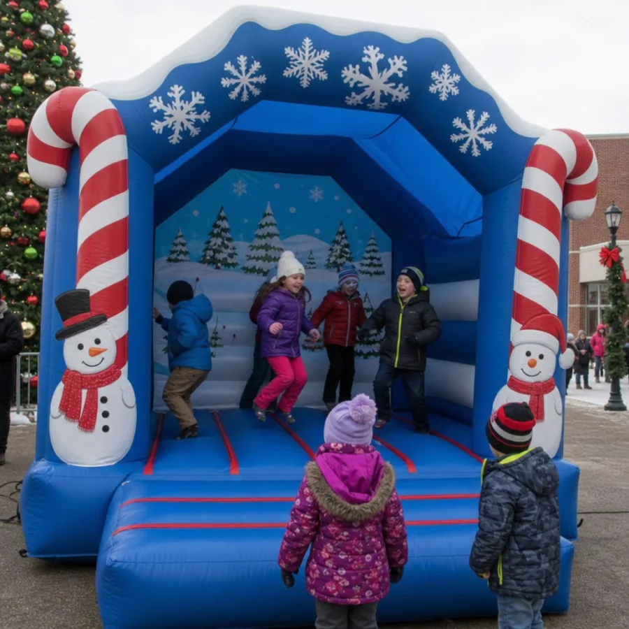 Children enjoying a winter bounce house at a holiday event
