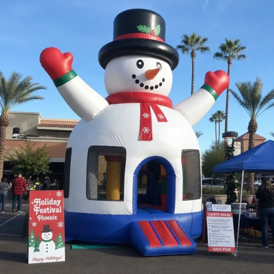 Inflatable snowman bounce house set up for a Phoenix holiday festival