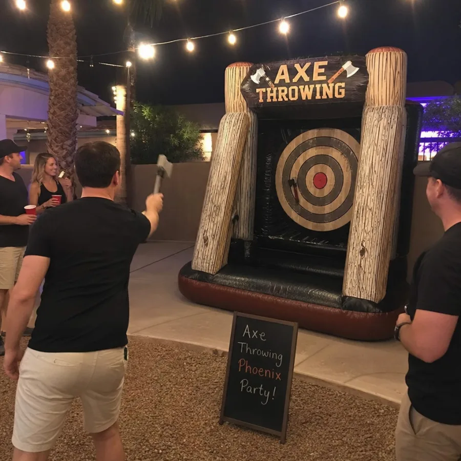 Inflatable axe throwing target game set up at a Phoenix party