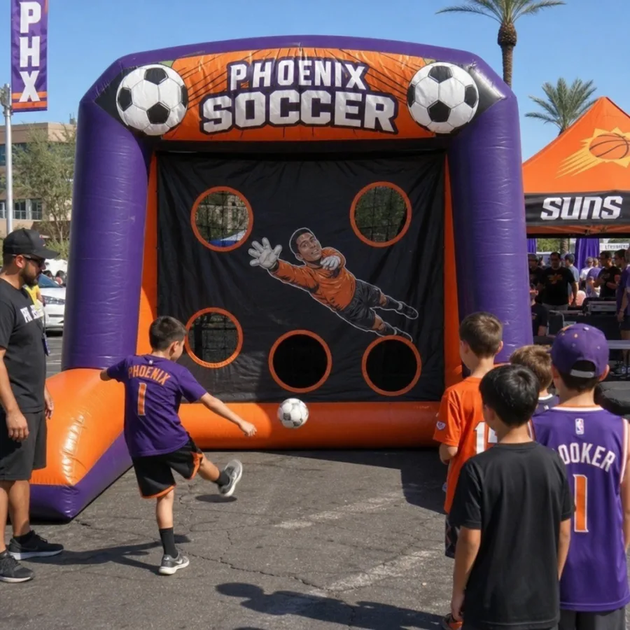 Inflatable soccer game set up at an outdoor Phoenix event