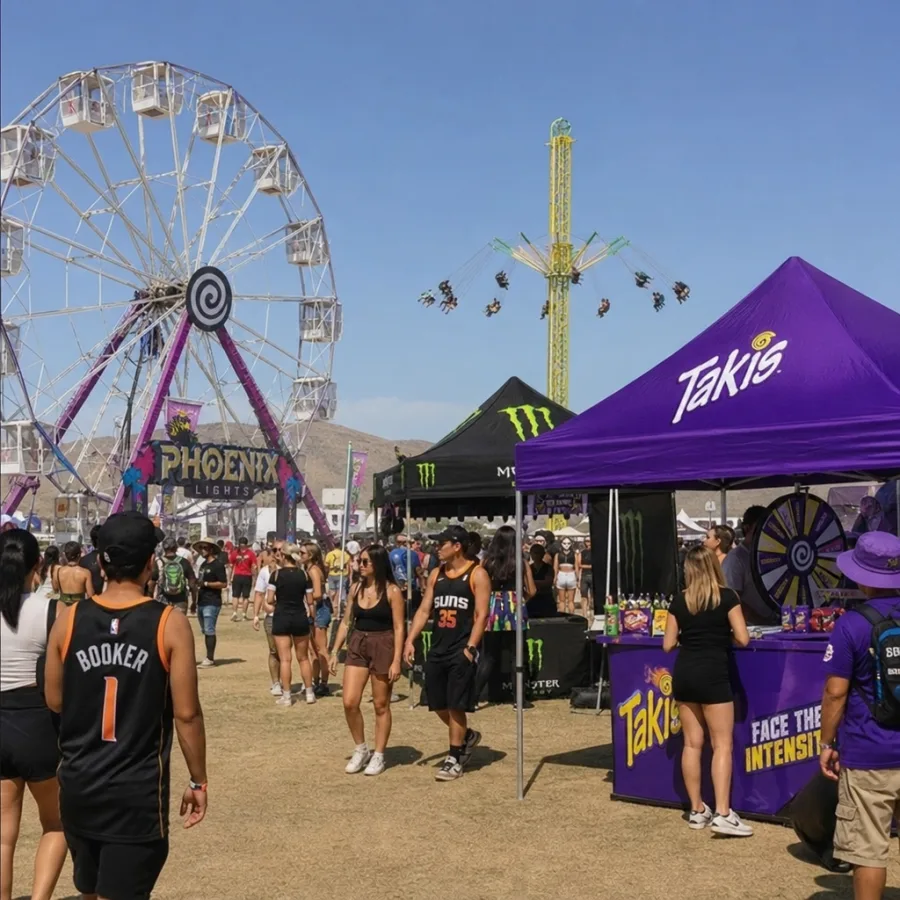 Outdoor Phoenix festival with carnival rides and branded activation tents