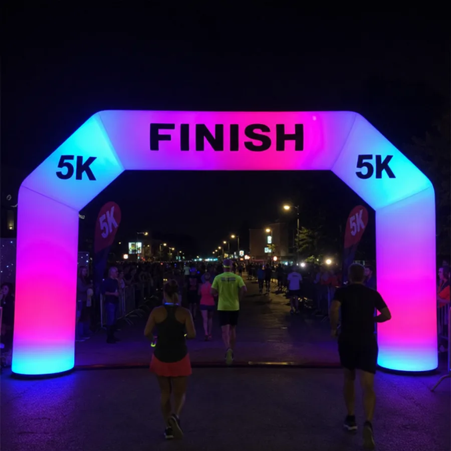 glowing inflatable arch with integrated LED lighting during a night time 5k race