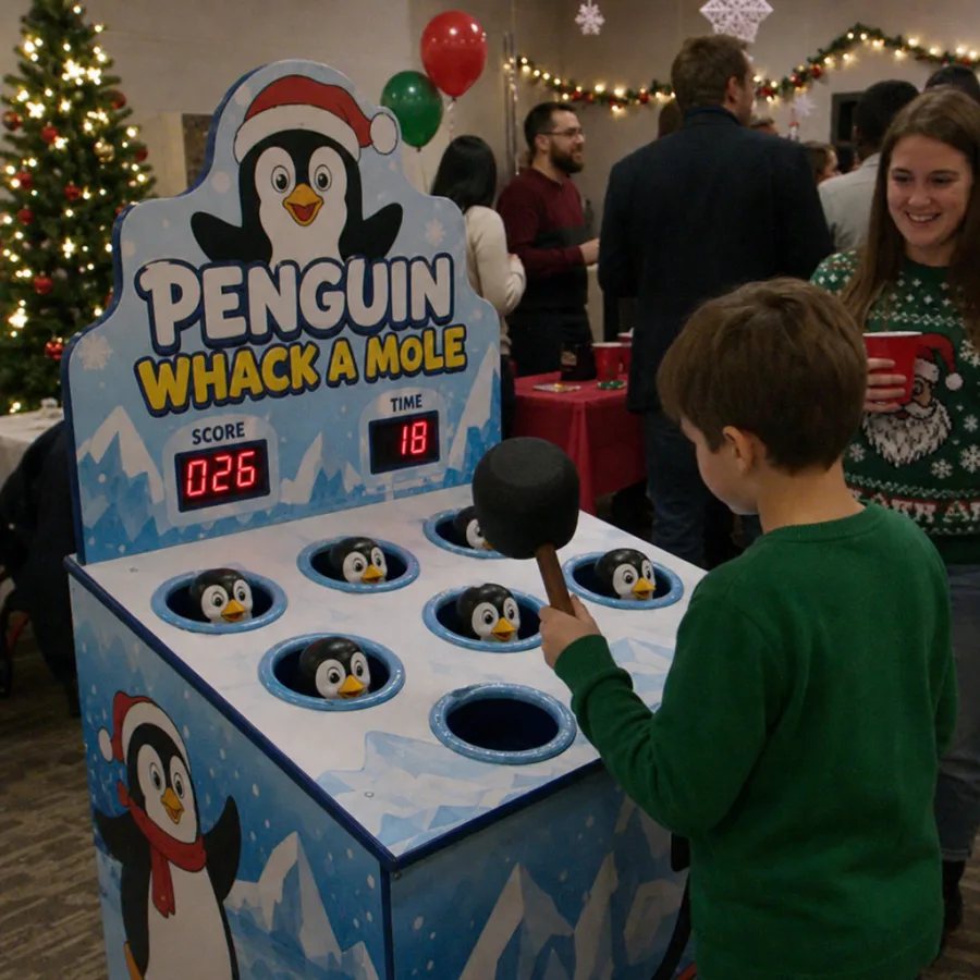 Penguin whack a mole arcade game at a holiday party