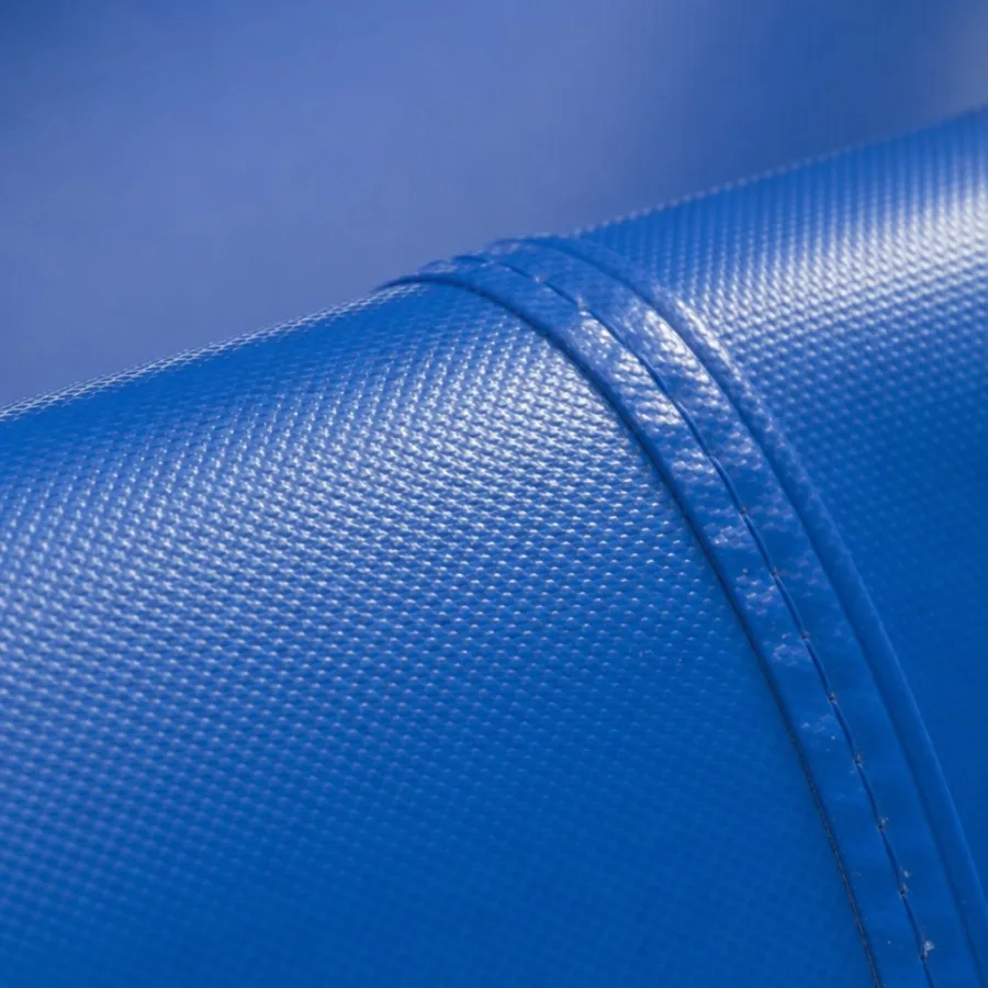 Close-up of a high-quality puncture-resistant PVC vinyl material used in commercial inflatables