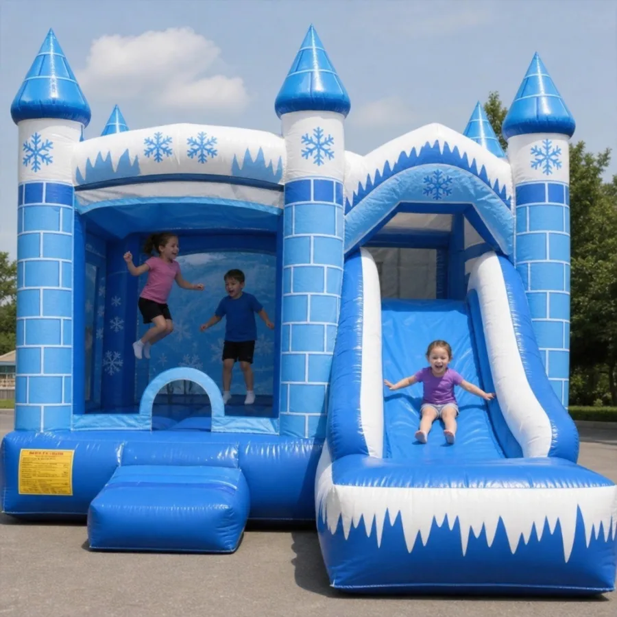 Children playing inside a blue and white ice castle bounce and slide combo