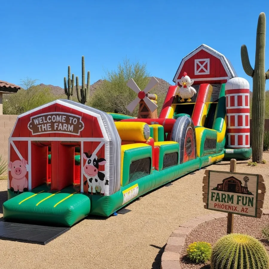 A vibrant farm and barn themed obstacle course rental for parties and events in Phoenix, Arizona set up in a sunny desert backyard with saguaro cactus in the background